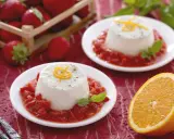 Délicieux panna cotta au lait sans crème, servi avec des fraises et une touche d'orange.