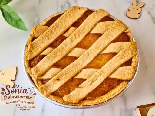 Délicieuse pastiera napoletana recette, une tarte traditionnelle italienne aux arômes de fleur d'oranger et de ricotta. Parfaite pour Pâques !